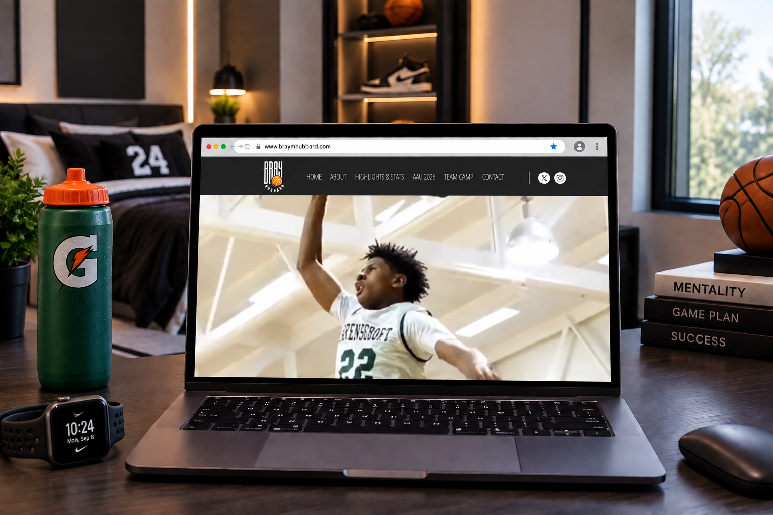 Athlete prospect website displayed on a laptop in a basketball-themed room